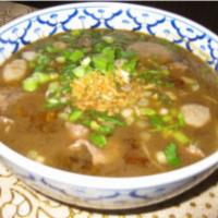 29. Bowl of Beef Stew Soup · A rare slice of steak, beef stew, beef tripe, beef ball in Thai style beef broth with bean s...