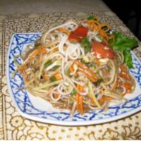32. Tum Soya Noodles Salad · Shredded raw papaya, tomatoes, long bean, cabbage, carrot, chili, noodles and homemade Lao’s...