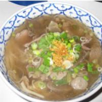44. Beef Noodle Soup · Pho original. A large bowl of clear beef noodles soup with a rare slice of steak, well-done ...