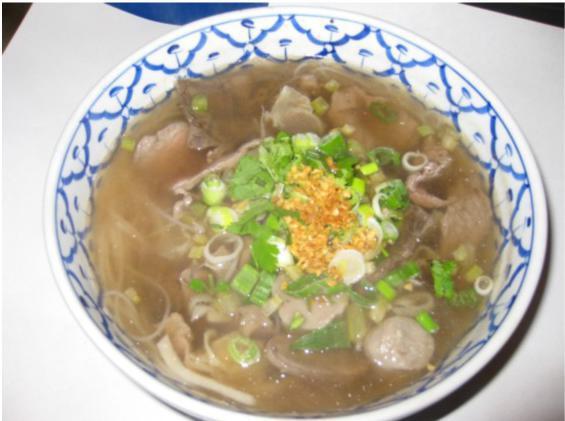 44. Beef Noodle Soup · Pho original. A large bowl of clear beef noodles soup with a rare slice of steak, well-done steak, tendon, tripe and meatball.