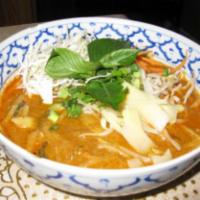 53. Khao Poun · Choice of chicken or fish curry with rice vermicelli, fresh vegetables and meatballs.