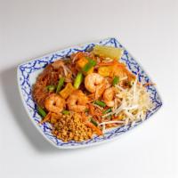 57. Pad Thai · Classical rice noodles are stir-fried with egg, tofu, bean sprout, green onion and crushed p...