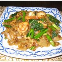 59. Pad See Ew · Stir-fried soft wide rice noodle scrambled with egg, Chinese broccoli. Choice of beef, pork ...