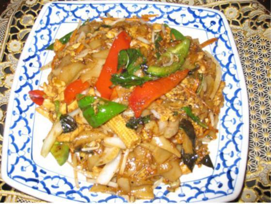 65. Bangkok Noodle · Soft wide rice noodle with bamboo, mushroom, long bean, carrot, baby corn and sweet basil. Choice of beef, pork, chicken. Substitute for shrimp or seafood for an additional charge.