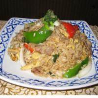 67. Drunken Fried Rice · Stir-fried rice with chili, onion, green bean and holy basil. Choice of beef, pork, chicken....