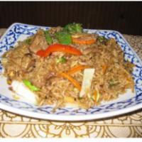 68. Bangkok Fried Rice · Stir-fried rice with chili, onion, green bean and sweet basil. Choice of beef, pork, chicken...