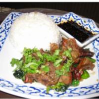 76.  Kao Nar Ped · Steamed rice topped with roasted duck and sauteed vegetables on the side.