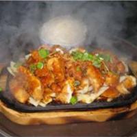 106. Siam Volcano · Lightly battered chicken or substitute for shrimp for an additional charge serve on the bed ...