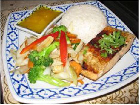 109. Salmon Steak · Fresh selected salmon marinated with Thai spice, grilled perfection served with sauteed vegetables, steamed rice and mango sauce on the side.