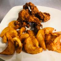 Chicken Strips · Hand-battered, seasoned buttermilk chicken strips served with fries and your choice of dippi...