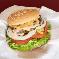 32. Charbroiled Cheese Burger · Quarter pound beef patty, American cheese, lettuce, tomato, pickle, onion & 1000 island dres...