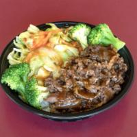 42. Beef Teriyaki Bowl · Grilled thin sliced rib eye, White rice, Steamed veggies (onion, cabbage, carrot, broccoli),...