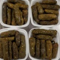Grape Leaves  · stuffed with rice and meat