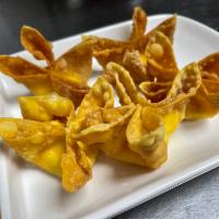 Crab Rangoon · Fried wontons stuffed with cream cheese and imitation crab meat served with sweet chili plum...