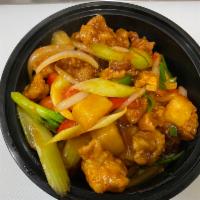 Sweet and Sour · Homemade sweet and sour sauce with pineapple, onions, bell peppers, and scallions.
