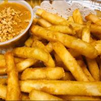 Coconut Curry Fries · Crispy fried with massaman curry dip.