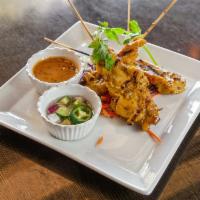 3.Chicken Satay  · Grilled chicken marinated in home-style sauce. Served with cucumber salad and peanut sauce.
