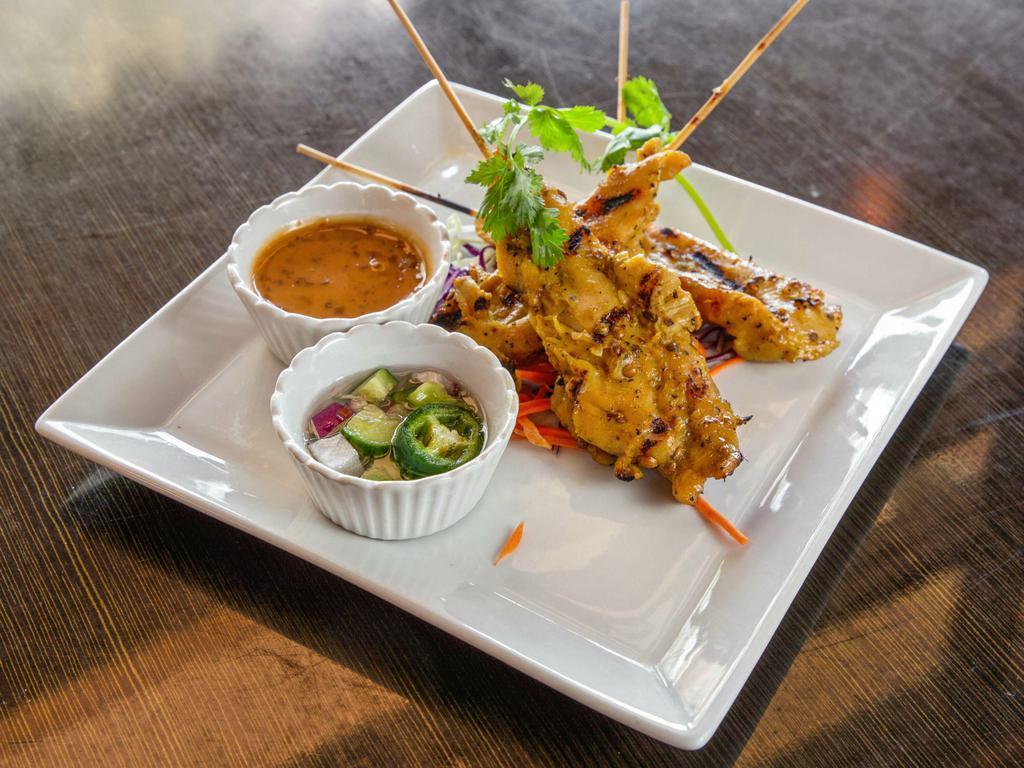 3.Chicken Satay  · Grilled chicken marinated in home-style sauce. Served with cucumber salad and peanut sauce.