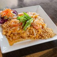 48. Pad Thai · Thin rice noodles stir-fried with meat of your choice, egg, green onions, bean sprouts and g...