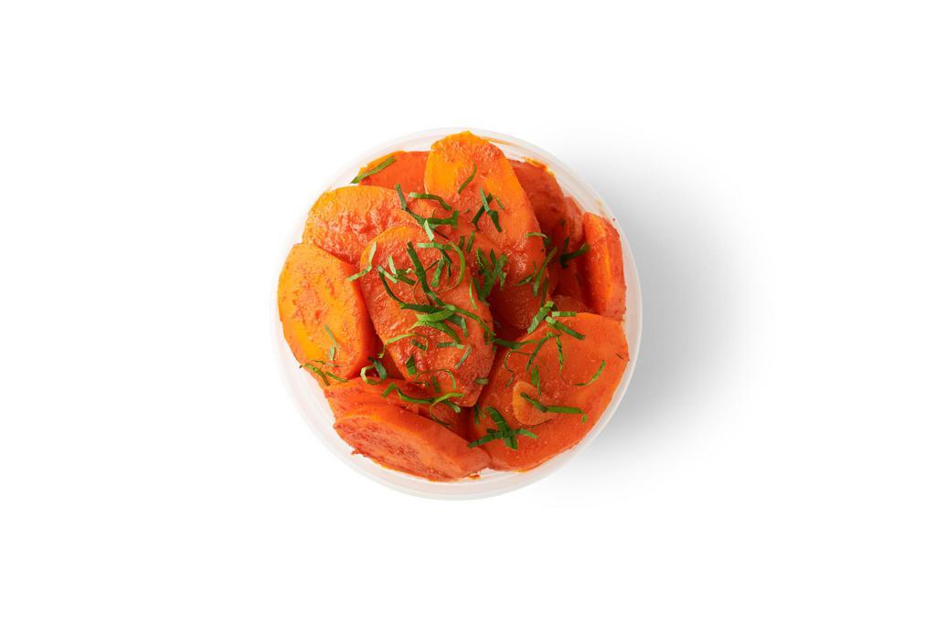 Moroccan Carrots  · Sautéed carrots infused with garlic, paprika, cumin, extra virgin olive oil and tomato paste.