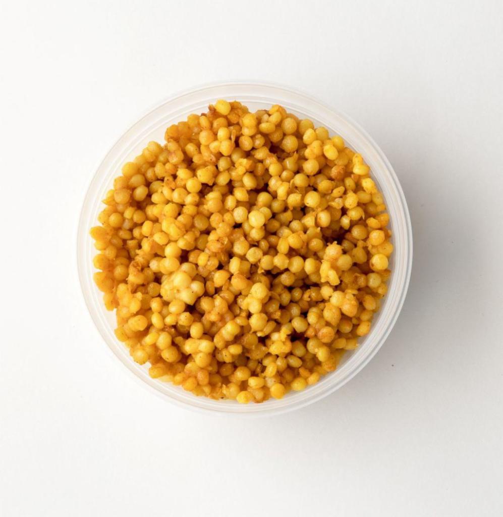Turmeric Pearl Couscous · Warm couscous with the delicious flavor of turmeric, cumin, and caramelized onions (1/2 pint).