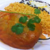 Chile Relleno Lunch · Roasted pasilla chile stuffed with cheese and cooked in roasted tomato sauce. Served with ri...
