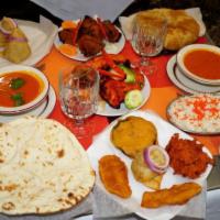 Curry Special Dinner for 2 · Choice of 2 soups, 2 appetizers: mixed vegetable pakora, vegetable or meat samosa, 2 main di...