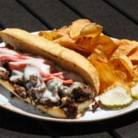 Italian Beef sandwich · Chef-made Italian roast beef + provolone cheese + roasted peppers + garlic aioli + French roll