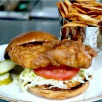 Tavern Fish Filet Sandwich · fresh hand-cut Icelandic cod + lettuce + tomatoes + Chef-made tartar sauce + B&B pickles + o...