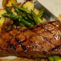 New York Strip · 14oz Prime USDA strip steak + Tavern potatoes + vegetable of the day