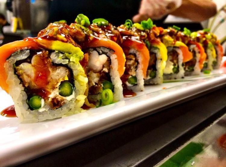 8 Pieces Northern Light Roll · Deep fried salmon inside, raw tuna, salmon and avocado on top with spicy mayo.