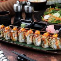 8 Pieces Dynamite Roll · Fried spicy tuna roll, topped with avocado, tobiko, and spicy mayo.