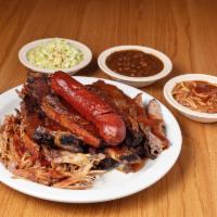 Sampler Platter · A trip to hog heaven! pork ribs, beef ribs, links, beef brisket, pork shoulder, BBQ spaghett...