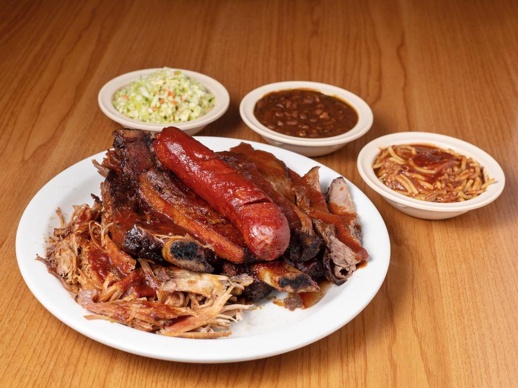 Sampler Platter · A trip to hog heaven! pork ribs, beef ribs, links, beef brisket, pork shoulder, BBQ spaghetti, beans, slaw and bread.
