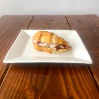 Ham and Cheddar Sandwich · Hot Sandwich. Shaved Black Forest ham, melted sharp white cheddar, and ouse-made Dijon aioli...