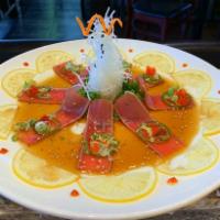 Pepper Tuna Tataki ·  Slices of peppered tuna served w. ponzu sauce