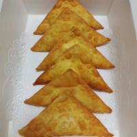 Crab Rangoon ·  Fried wonton wrapper filled with crab and cream cheese.