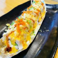 Hot Samurai Roll · Baked whole roll. Crab salad, avocado, tempura flakes topped with salmon, spicy mayo, eel sa...