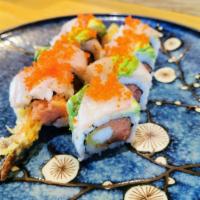 Sex on the Beach Roll · Shrimp tempura and spicy tuna topped with yellowtail, avocado, and tobiko.