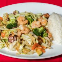 59. House Stir-Fry · Delicious stir-fried vegetables with chicken, beef, pork, and prawn.