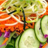House Salad · Greens, carrots, cucumber, zucchini noodles, avocado, purple cabbage and homemade dijon dres...