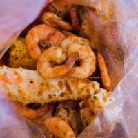 Combo 2 · 1 lb. of peeled shrimp, 1 lb. of mussles, 1 lb. of king crab legs, 2 corns, 2 potatoes, and ...