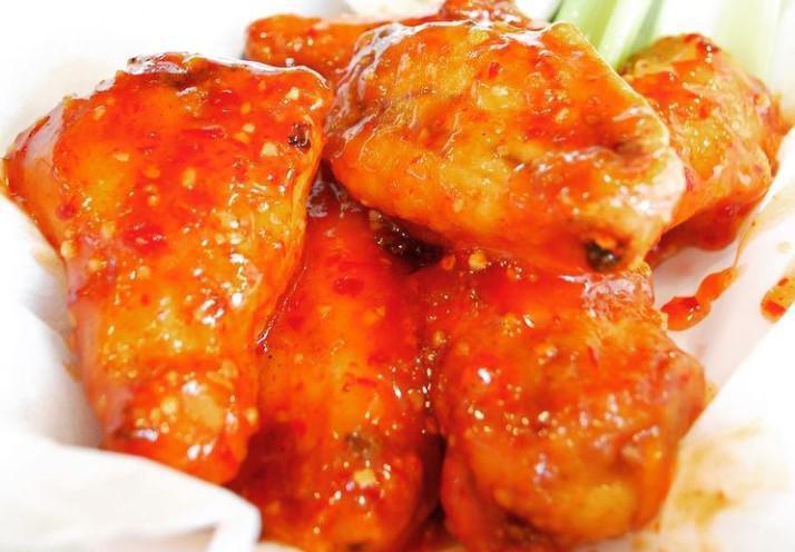 Bone-in Wings · Our bone-in wings smothered in your choice of sauce. BBQ, Buffalo, sweet Thai chili or try one of our new sauces: mango habanero or Parmesan garlic. Celery, ranch, or bleu cheese available upon request.