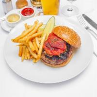 Prime Custom Blend Burger · Hand-cut fries, roasted tomato, sauteed onion and cheddar.