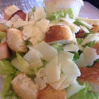 Caesar's Salad · Romaine lettuce, house made croutons and shredded Parmesan cheese with  creamy Caesar dressi...
