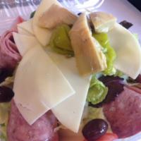 Antipasto Salad · Mixed greens, Genoa salami, ham, cooked salami, provolone cheese, marinated artichoke heart ...