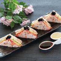 Pizza Sandwich · Spicy tuna, avocado, tamago, masago, crab, lobster salad topped with eel sauce and wasabi sa...