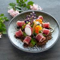 Tuna Tataki Salad · Seared tuna, mixed green with onion dressing.