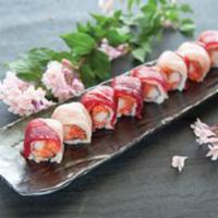 Rich Roll · Spicy tuna, crunch crab, top with tuna and yellowtail.