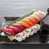 Tricolor Sushi · 3 tuna, 3 salmon, 3 yellowtail and tuna avocado roll. Served with miso soup or salad.